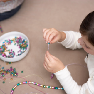 Montessori bead stringing activity